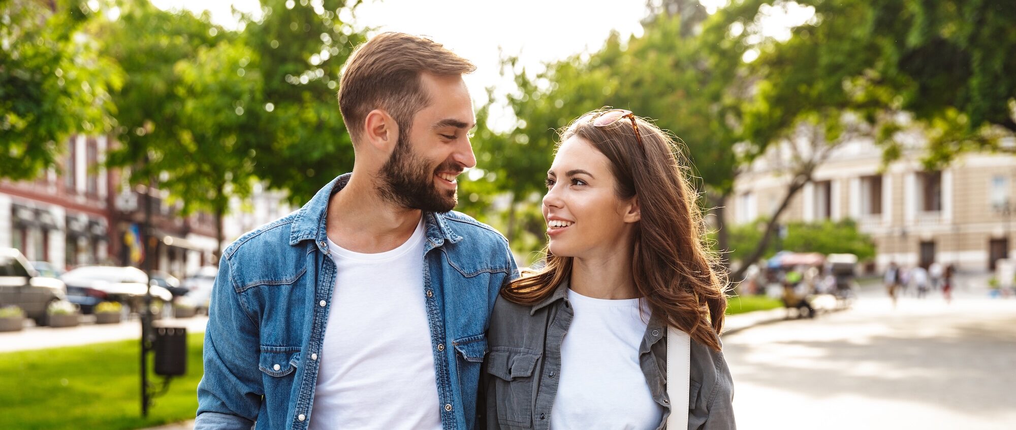Young couple in love walking outdoors in their trip to Austin